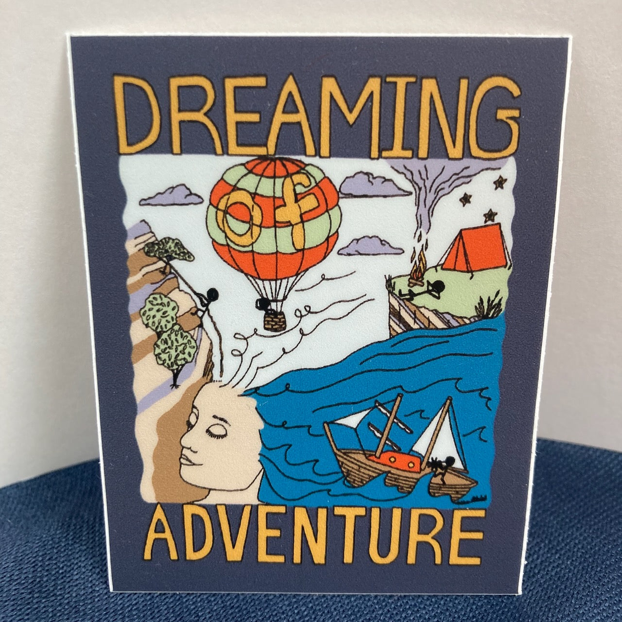 Dark-Blue Dreaming Adventure Vinyl Sticker (2.32″ × 3″)