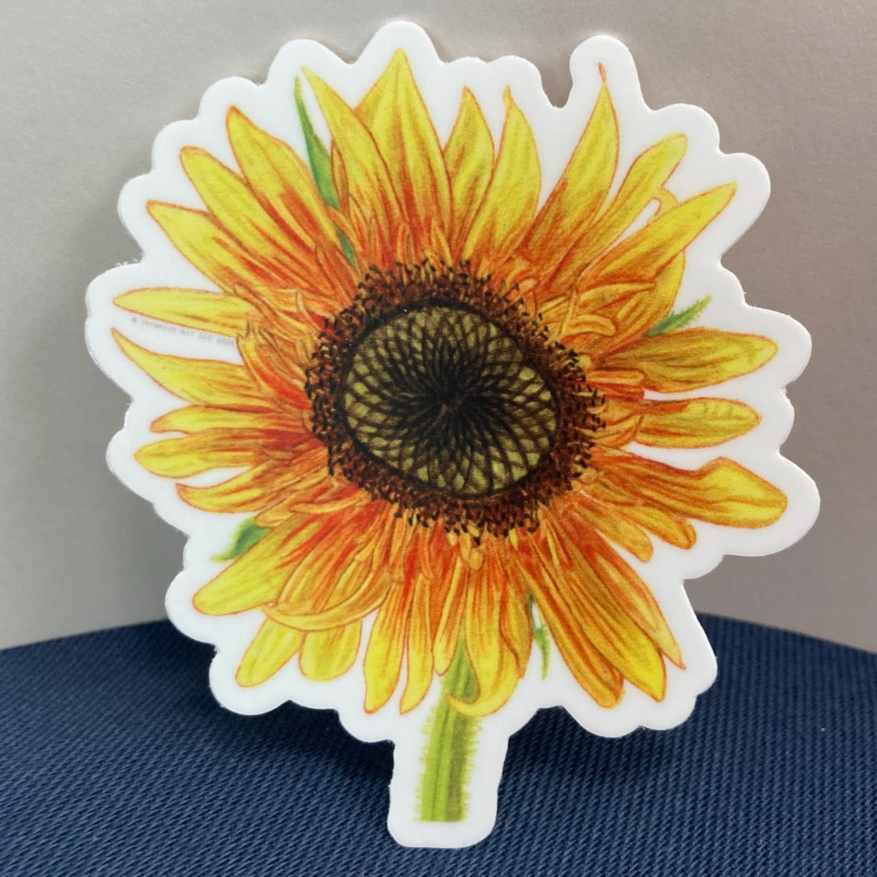 Ring of Fire Hybrid Sunflower Vinyl Sticker (2.63″ × 3″)